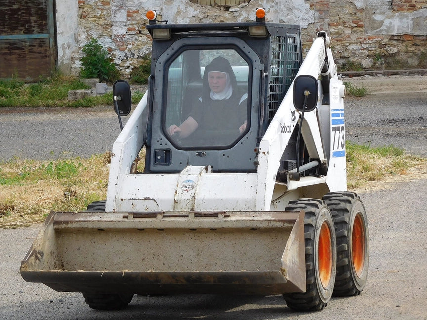 Nuns Operate Bobcat Loader to Restore New Home